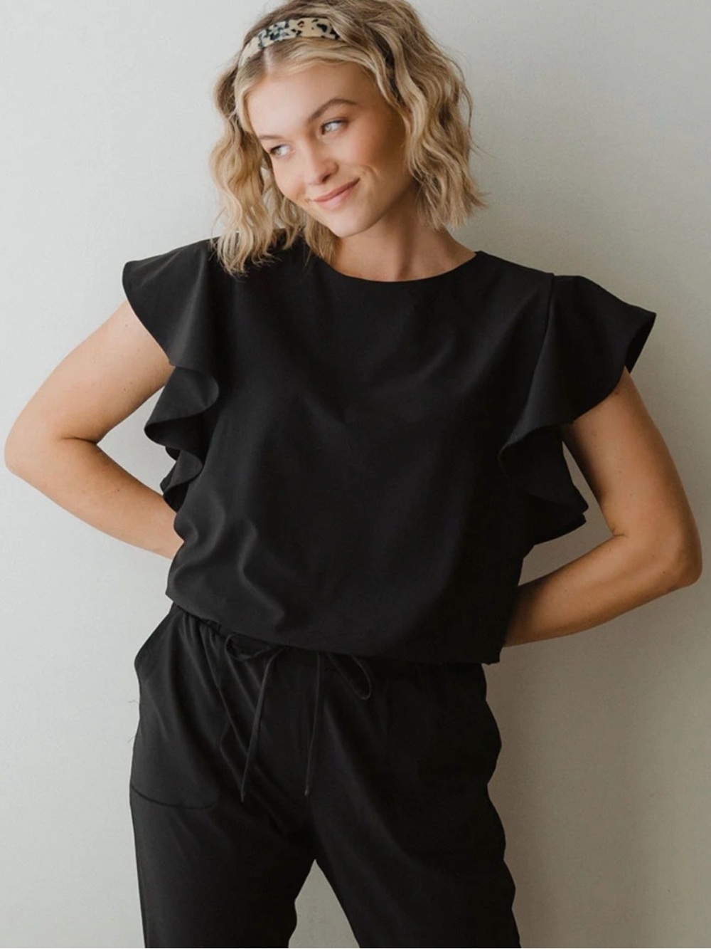 Albion Fit 9 to 9 Black Ruffle Sleeve one piece jump suit